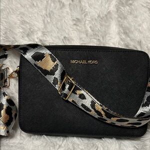 Michael Kors Black Messenger Bag with Gold Accents